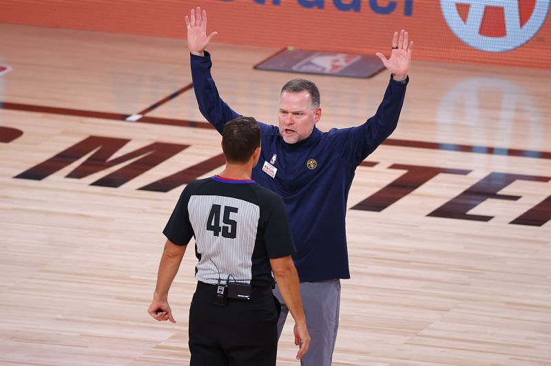 Nuggets head coach Mike Malone in a casual outfit in the NBA bubble